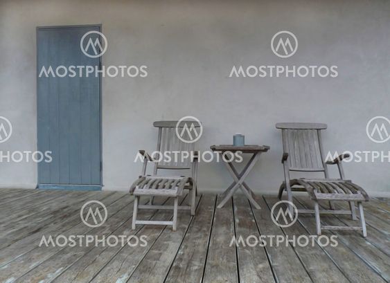 Lounge chairs and blue door