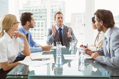 Business people in board room meeting