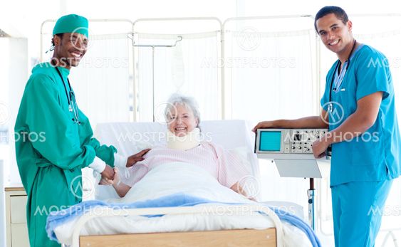 Team of Doctors with a Patient