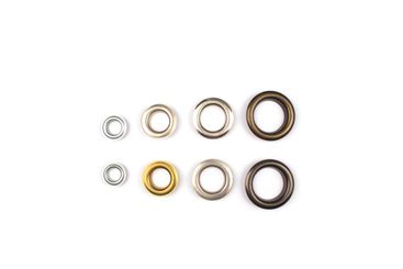 Set of brass multicoloured metal eyelets or rivets -...