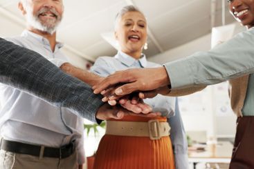 Business people, teamwork and hands together for...