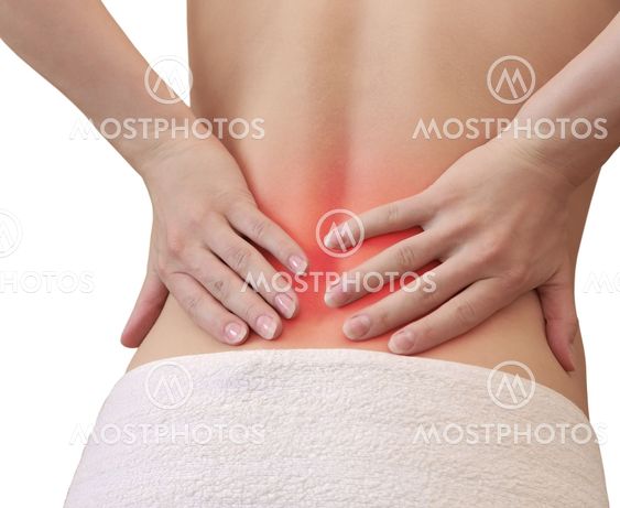 Woman holding hands on spot back in pain isolated on white