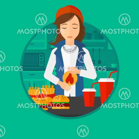 Woman suffering from heartburn.