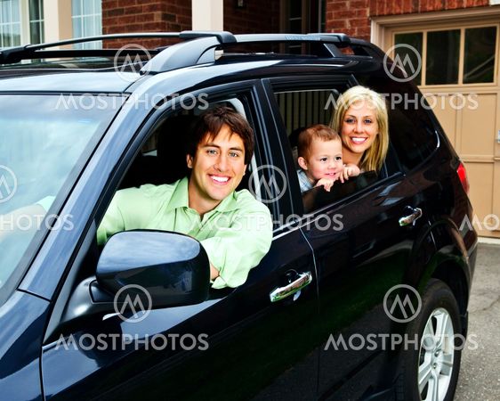 Happy family in car
