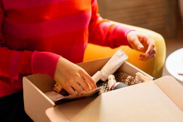 A young attractive African woman in casual clothing is...