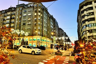 Urban evening view of Vigo city streets with Christmas...