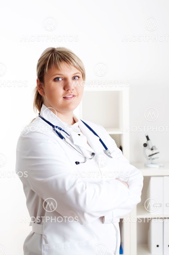 Smiling medical doctor woman with stethoscope.