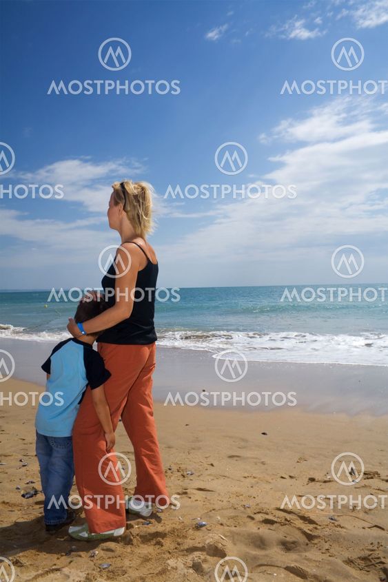 Mother and son on the beach