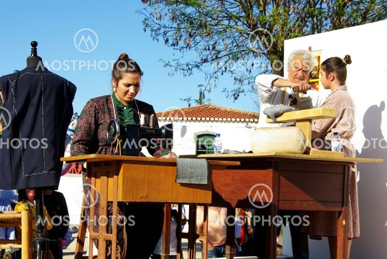 dressmaker and tailor working