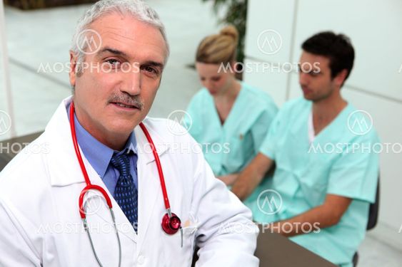 Three medical professionals