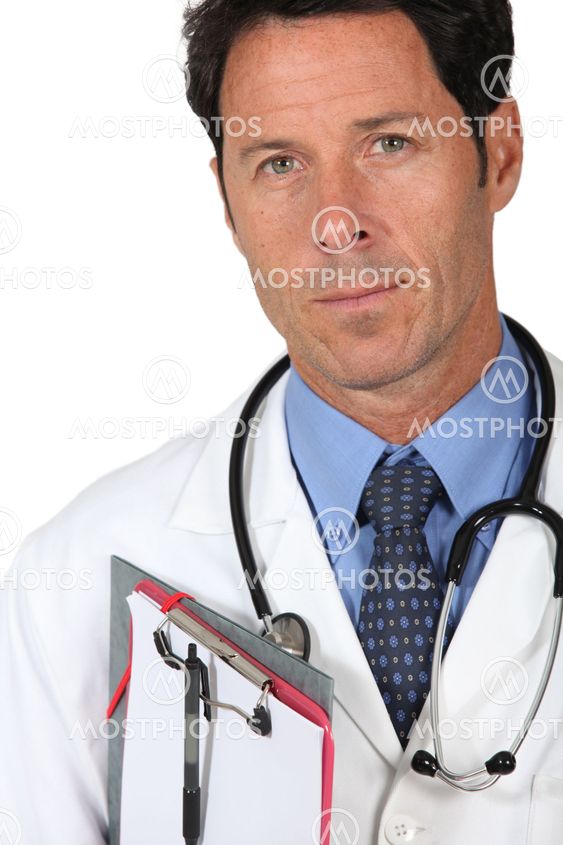 Male doctor stood with clipboard