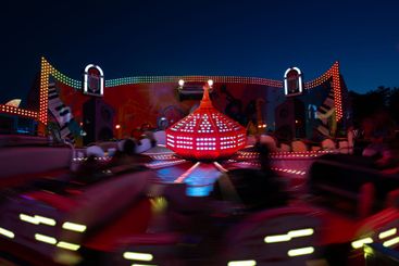 A colourful ferris wheel in Luna park during night.