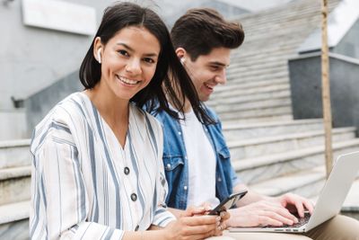 Happy young amazing loving couple business people...