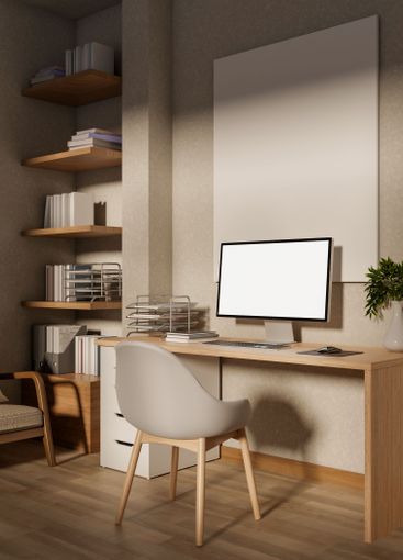 A cozy, modern home office bathed in warm daylight, with...