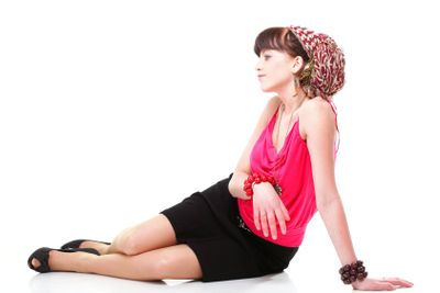 Full length woman in a turban isolated