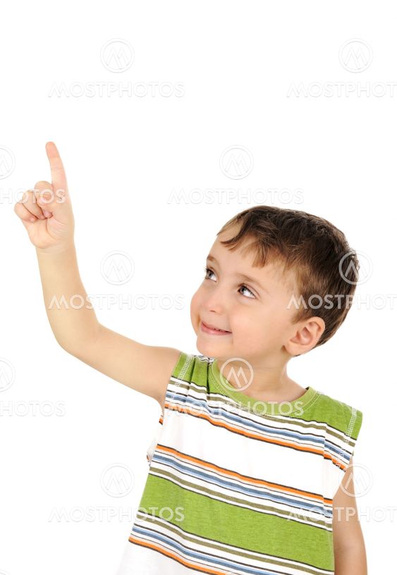 Cute kid looking and finger pointing isolated