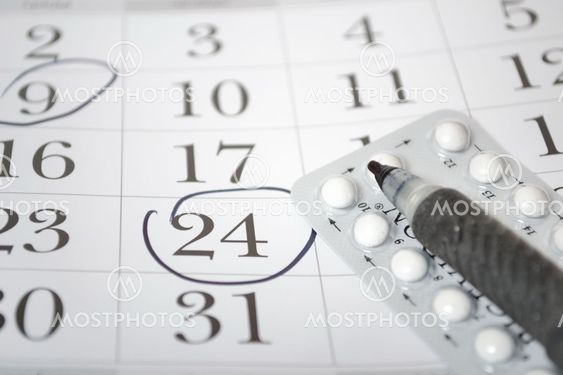 Birth control pills and pen