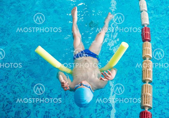Child swimmer in swimming pool