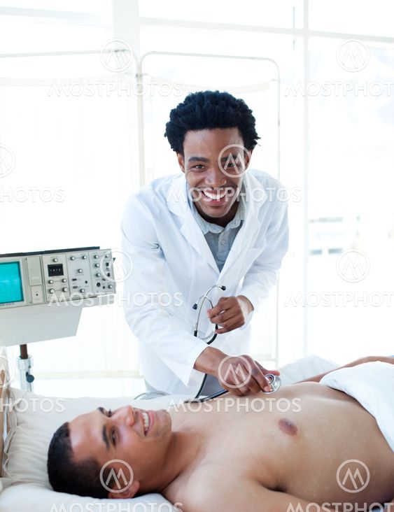 Afro-american doctor examining a patient