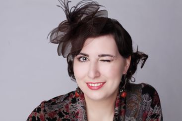 Winking brunette woman in red hat retro style fashion...