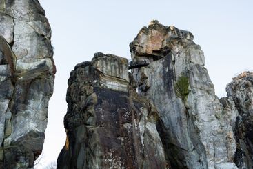 Large rocky rocks. Rocks of rocks. Gray moss-covered rocks
