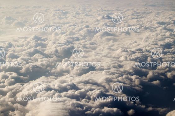 dramatic blue sky with clouds and sun rays
