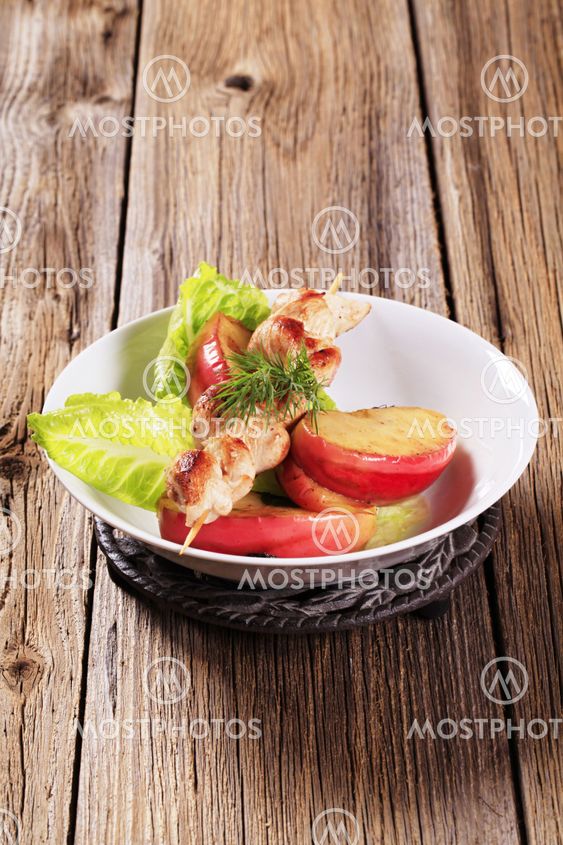 Chicken skewer and baked apple