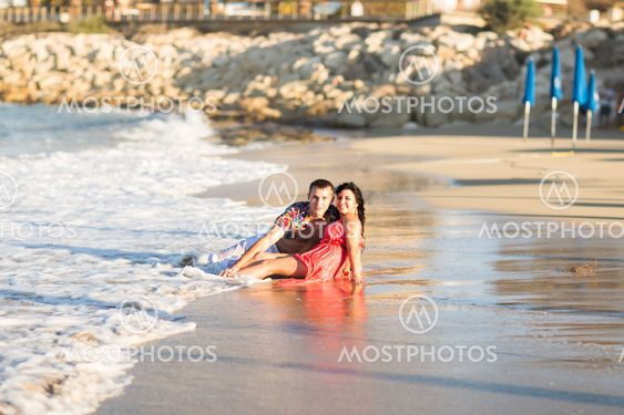 happy couple on the beach