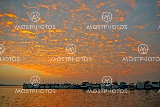 Yachts anchored at dusk