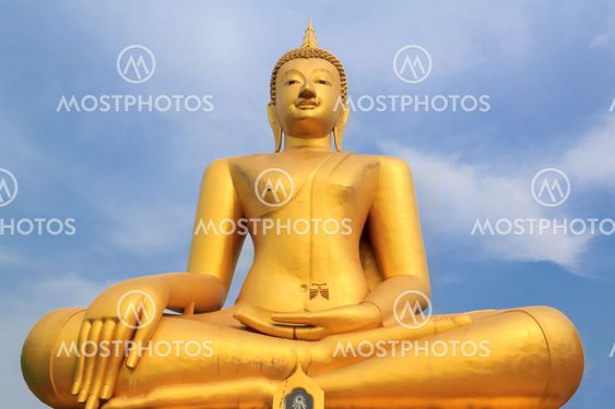 the golden buddha statue in temple