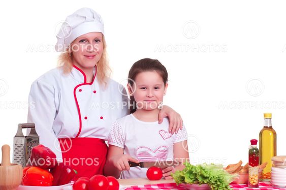 Mother and daughter cooking dinner