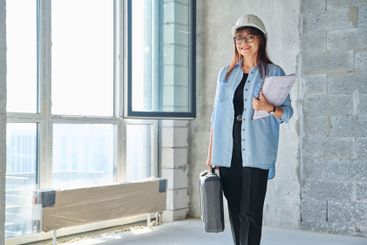 Portrait of female architect decorator of final...