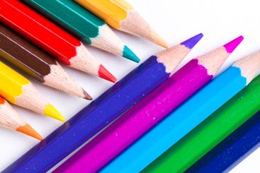 Colorful assortment of colored pencils arranged...