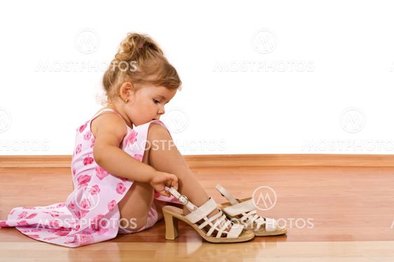 Trying mom's shoes