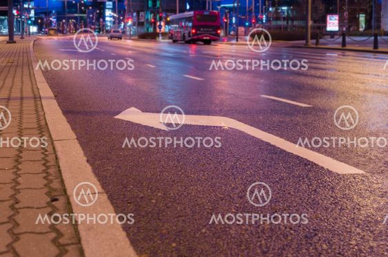 Turn left sign marking on asphalt