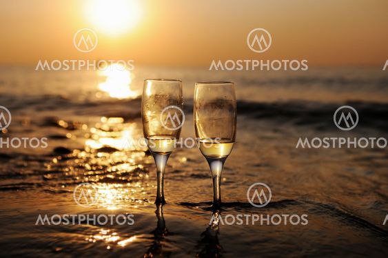 Romantic beach evening on the sunset