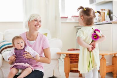 Delighted mother get surprise by her daughters 