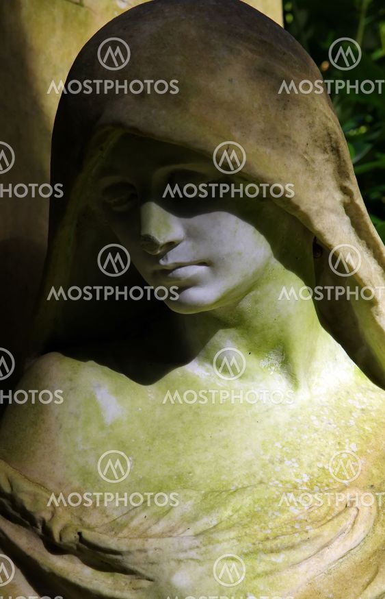 Vintage cementery sculpture face
