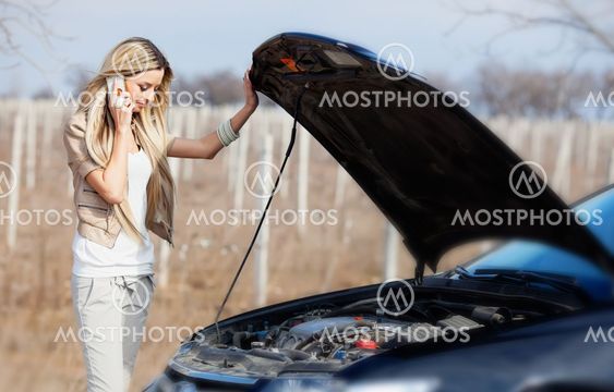 Girl with broken car
