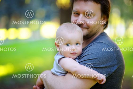 Portrait of father with his little son