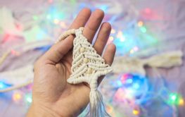 Handmade crochet new year decoration in woman hands....