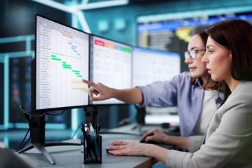 Professional woman using Gantt chart