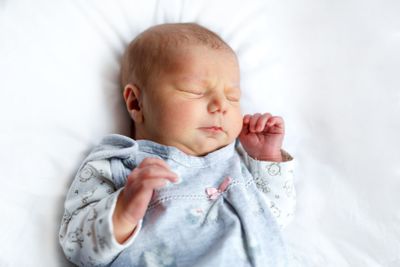 Portrait of cute adorable newborn baby girl sleeping