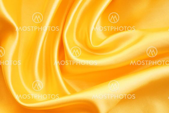 Smooth elegant golden silk as background