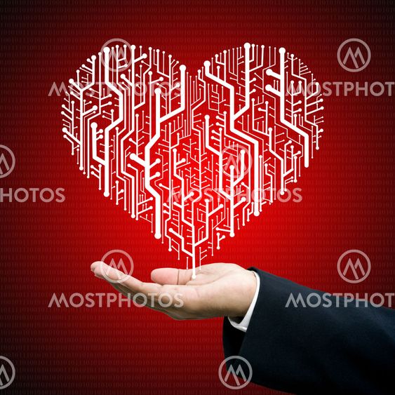 Businessman give the Circuit board in heart shape