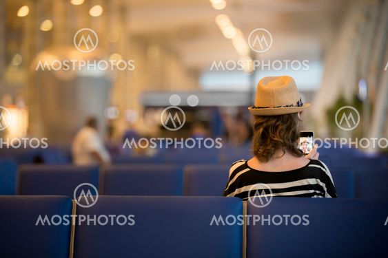 Young traveling woman waiting for transport