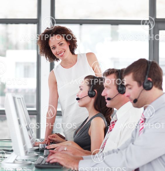 Cute female manager with her sale representative team