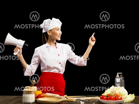 Asian female chef holding a megaphone