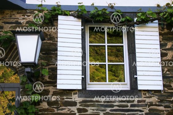 Window and a lamp of the stone house, Kattenes village,...
