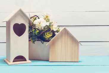 Shabby chic style home decorations on wooden background